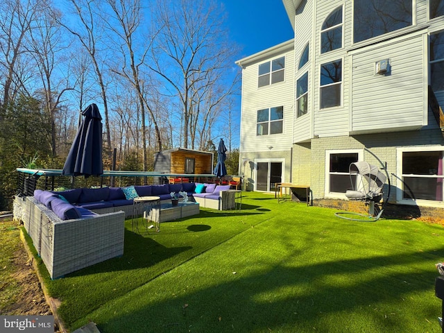 view of yard with an outdoor living space