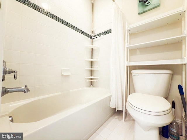 full bathroom with tile patterned flooring, toilet, and shower / tub combo