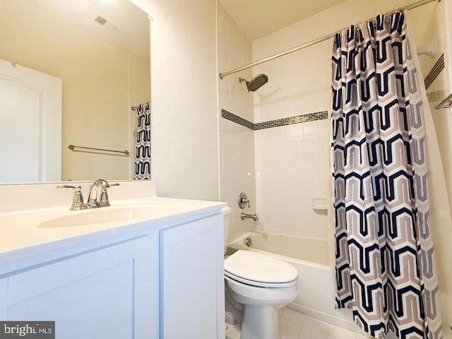 bathroom featuring visible vents, toilet, tile patterned floors, vanity, and shower / bathtub combination with curtain