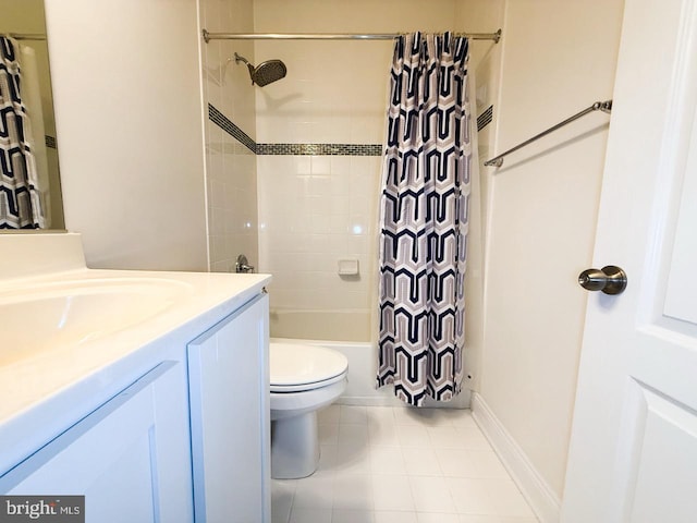 full bathroom with tile patterned floors, shower / tub combo, toilet, and vanity