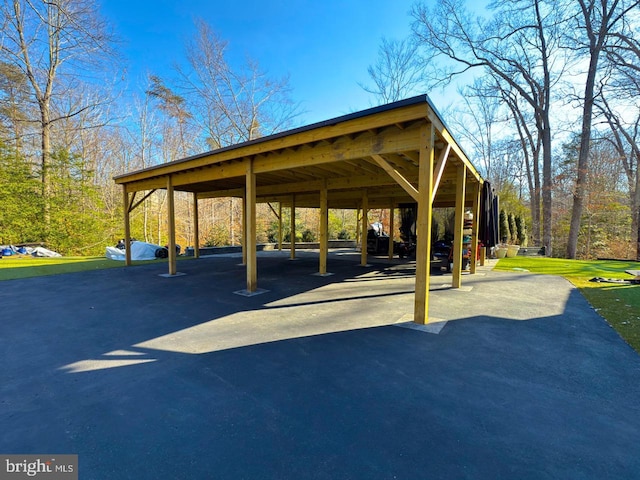 exterior space with a carport