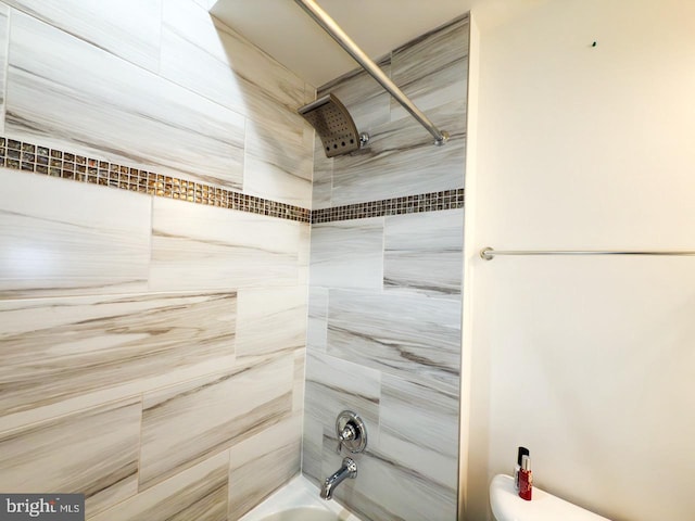 full bathroom featuring toilet and shower / washtub combination