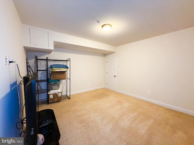 finished basement with carpet flooring and baseboards