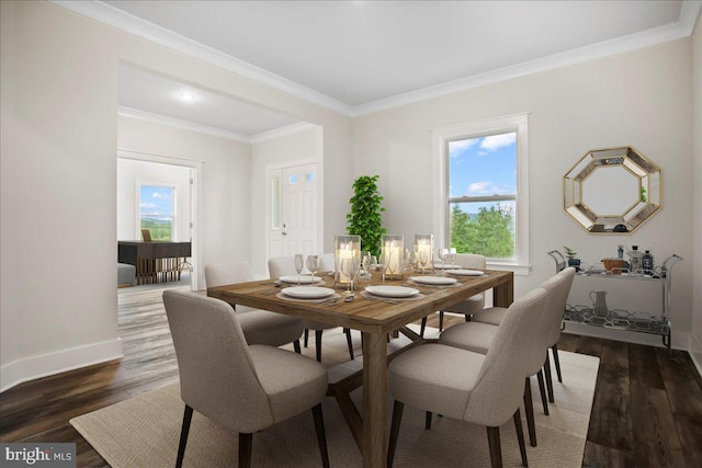 dining space with dark wood finished floors, crown molding, and baseboards