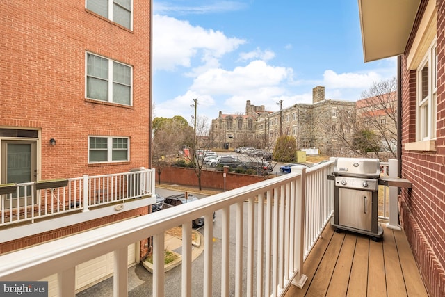 balcony featuring area for grilling