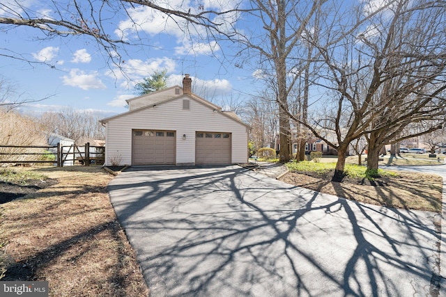 detached garage with fence