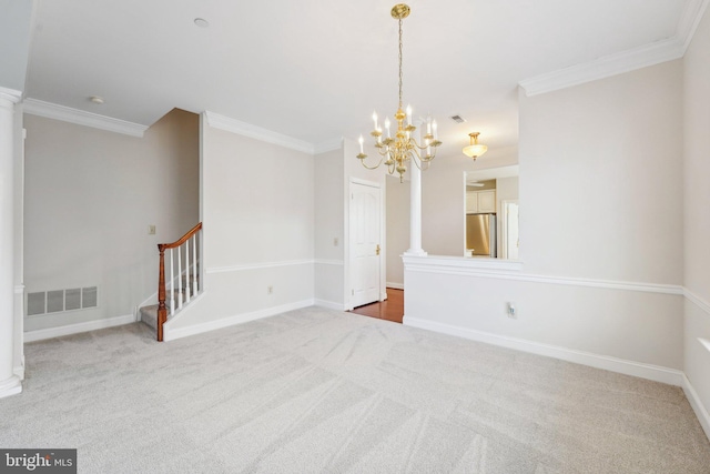 unfurnished room featuring baseboards, stairway, visible vents, and crown molding