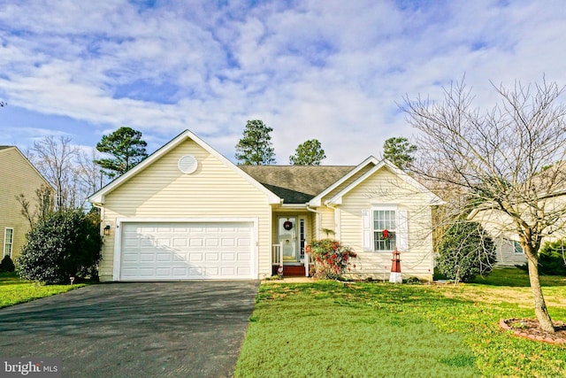 ranch-style house with a garage, aphalt driveway, and a front lawn