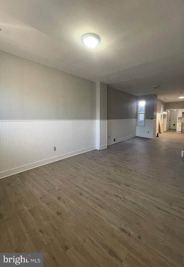 interior space with dark wood-type flooring