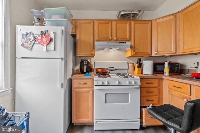 kitchen featuring white appliances