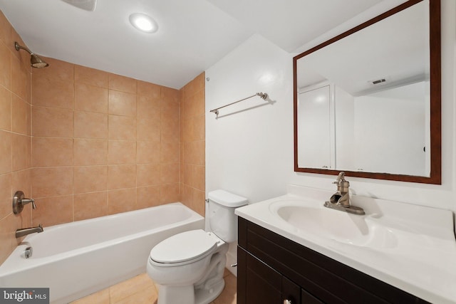 bathroom featuring toilet, shower / bathtub combination, visible vents, and vanity