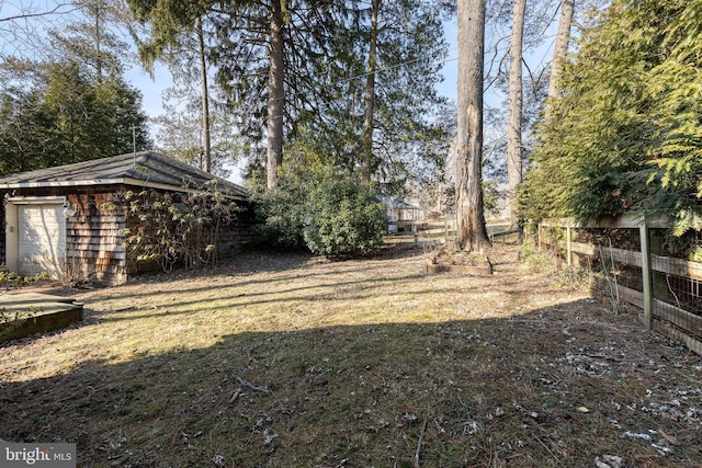 view of yard with fence