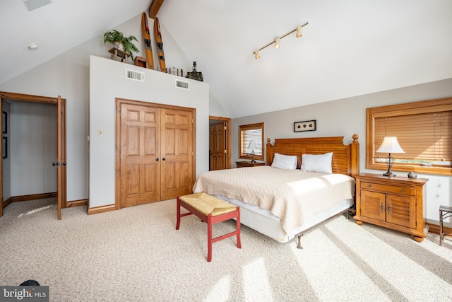 bedroom featuring a closet, carpet, visible vents, and baseboards