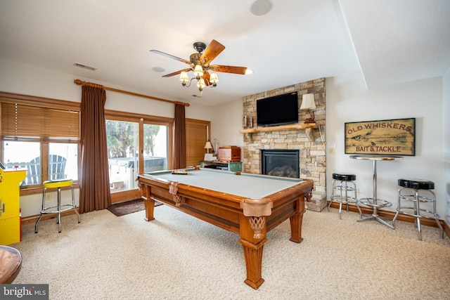 recreation room featuring a fireplace, light colored carpet, visible vents, ceiling fan, and billiards