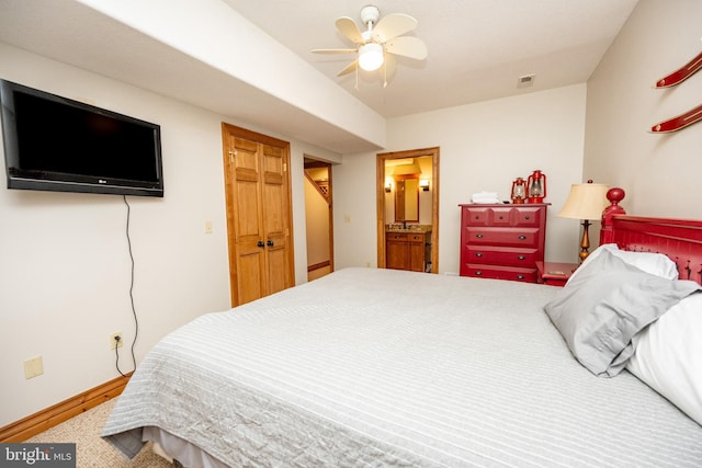 bedroom with a ceiling fan, visible vents, and baseboards