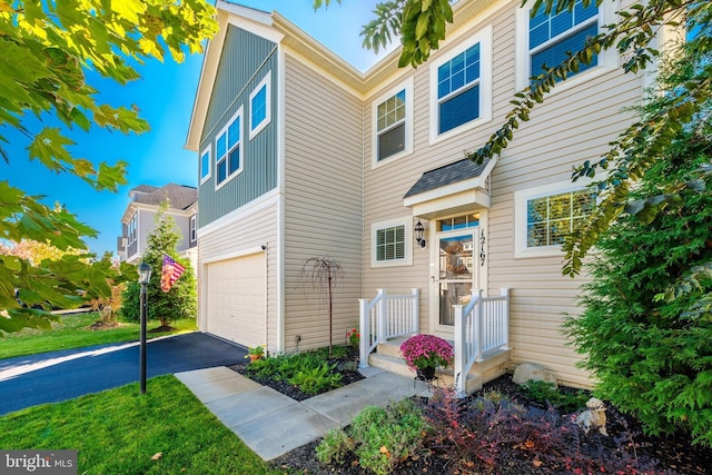 view of property featuring a garage