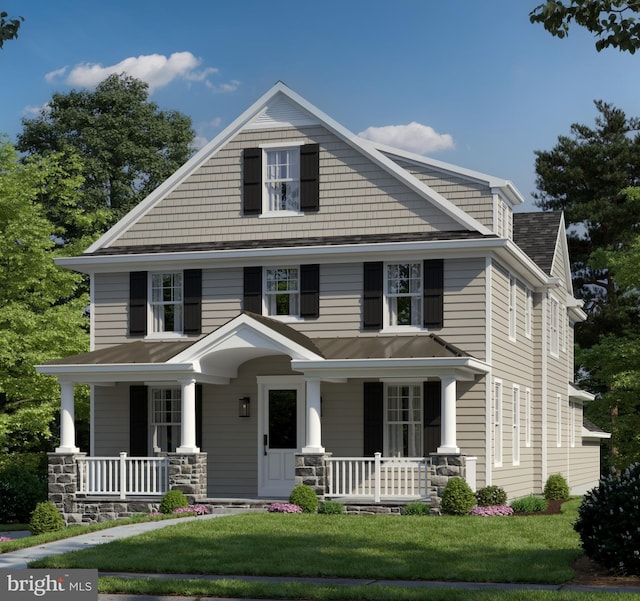 traditional style home with metal roof, a porch, a standing seam roof, and a front yard