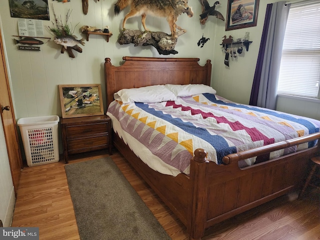 bedroom featuring wood finished floors