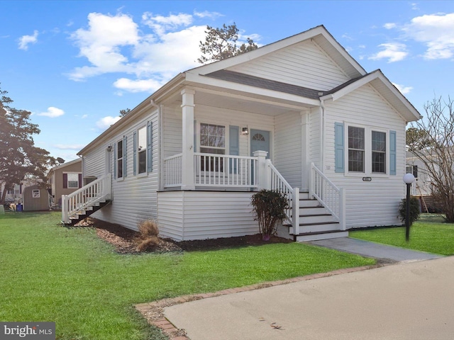 view of front facade with a porch and a front yard