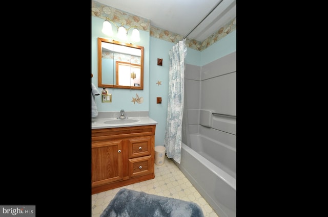 bathroom featuring tile patterned floors, shower / tub combo with curtain, and vanity