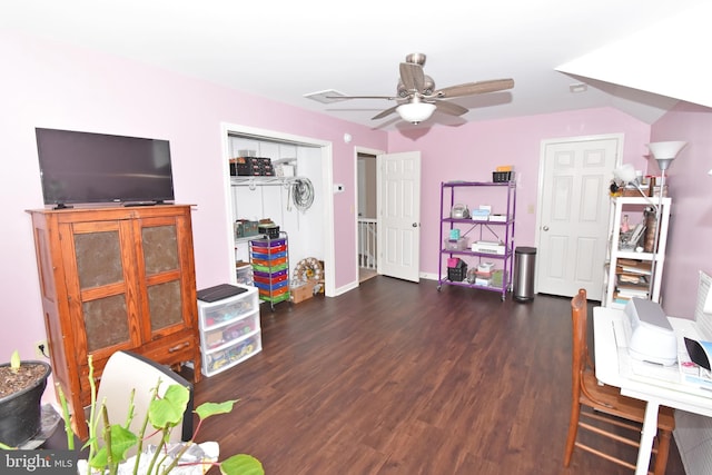 game room with ceiling fan, baseboards, and dark wood-type flooring