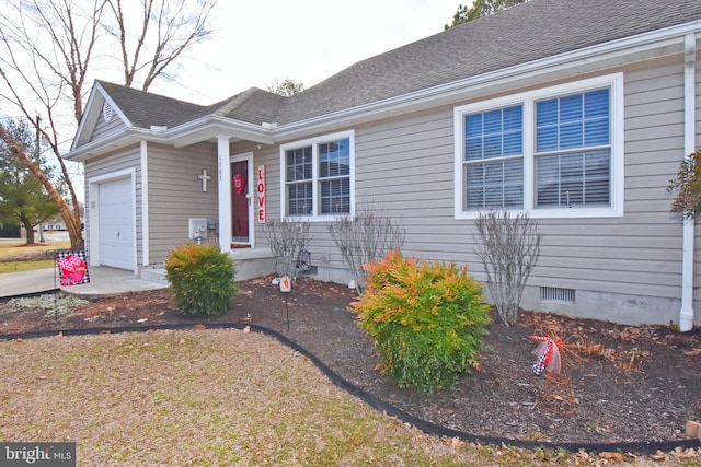 single story home with a shingled roof, crawl space, and an attached garage