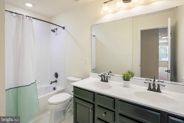 bathroom featuring shower / bath combo, toilet, tile patterned flooring, and a sink