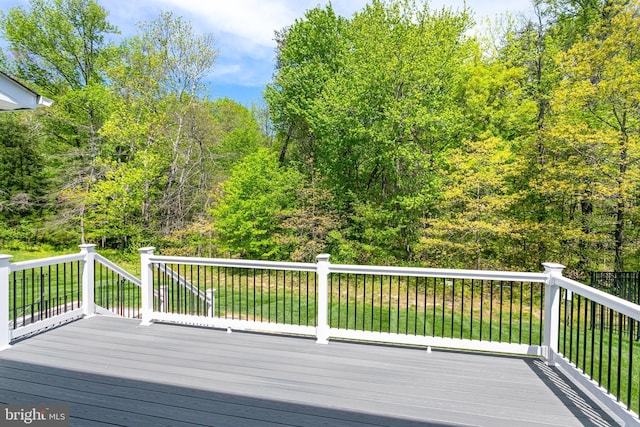 deck featuring a yard