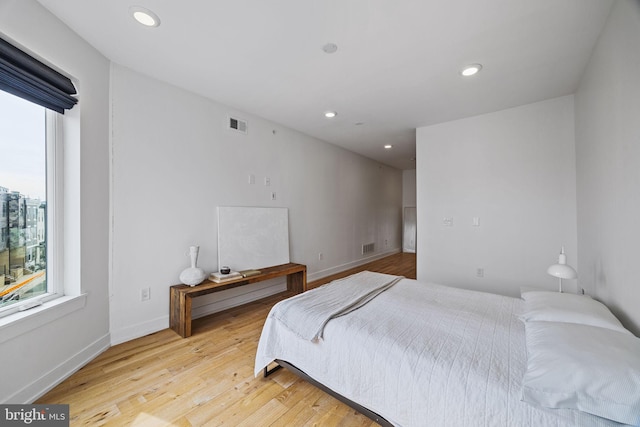 bedroom featuring light hardwood / wood-style floors