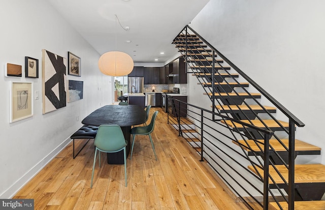 dining room featuring light wood-type flooring