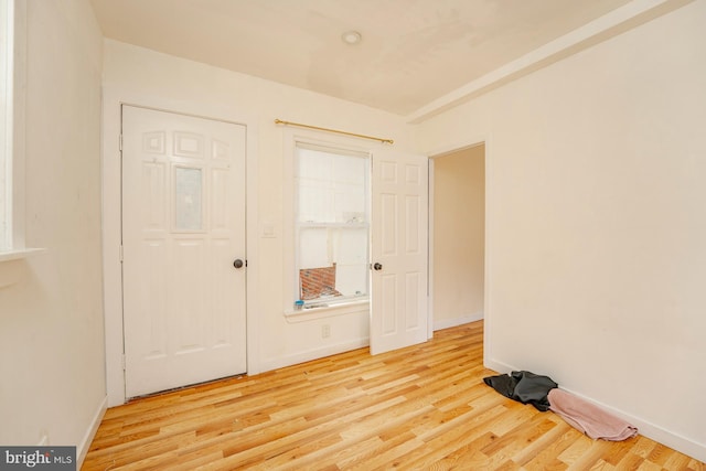 unfurnished bedroom with light hardwood / wood-style floors