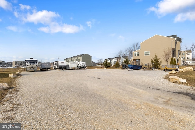 view of road with a residential view