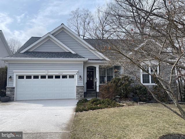 view of front of property with a garage, stone siding, driveway, roof with shingles, and a front lawn