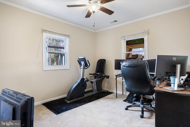 office area featuring crown molding, visible vents, and carpet floors