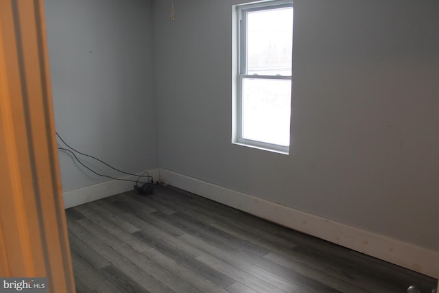 empty room featuring hardwood / wood-style flooring