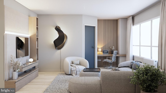 living room featuring light hardwood / wood-style floors and a wealth of natural light