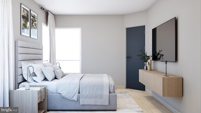 bedroom featuring light wood-type flooring