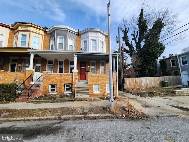 multi unit property featuring a porch