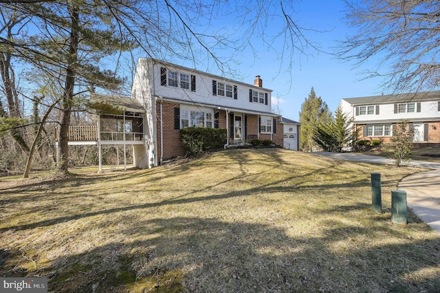 view of front of house featuring a front lawn and a porch