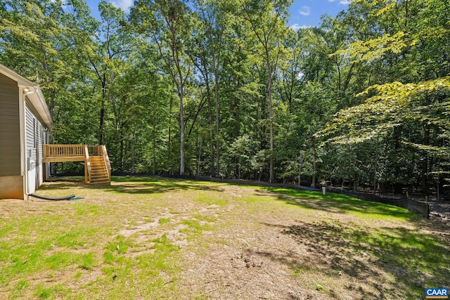 view of yard featuring a deck