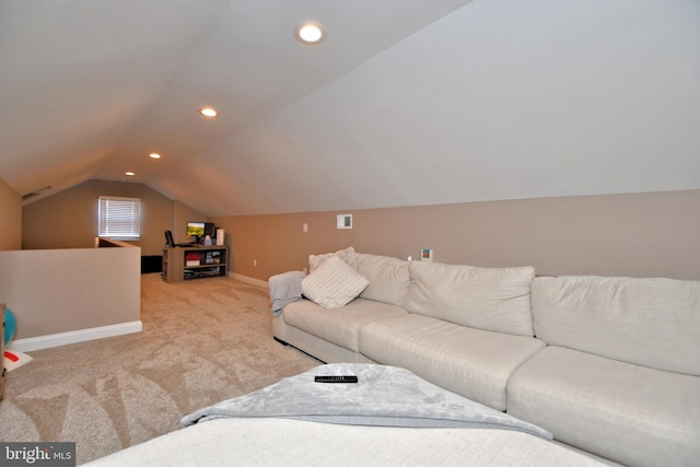 carpeted living area with visible vents, baseboards, vaulted ceiling, and recessed lighting