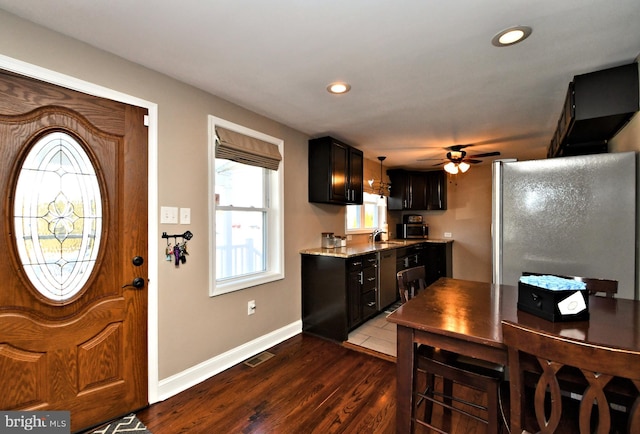 kitchen with recessed lighting, visible vents, baseboards, appliances with stainless steel finishes, and dark wood-style floors