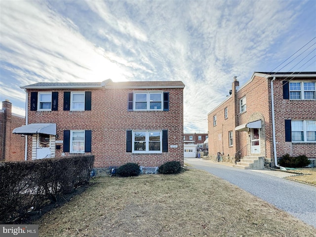 view of front of home with a front yard