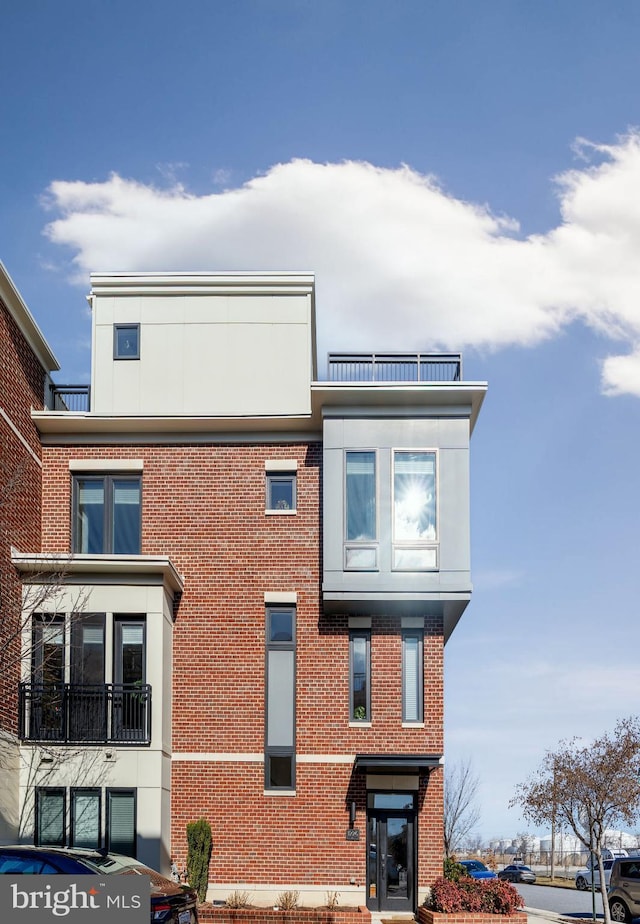 view of front of property with brick siding