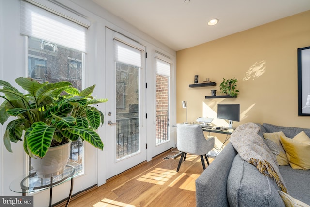 interior space with plenty of natural light and wood finished floors