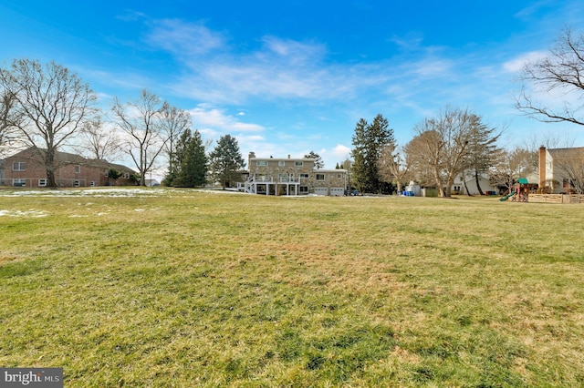 view of yard featuring a playground