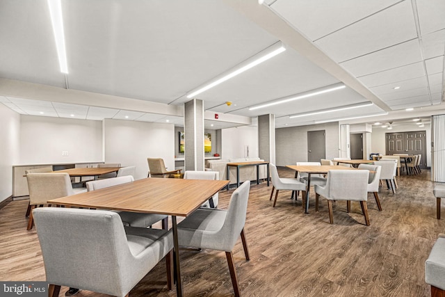 dining room with hardwood / wood-style floors