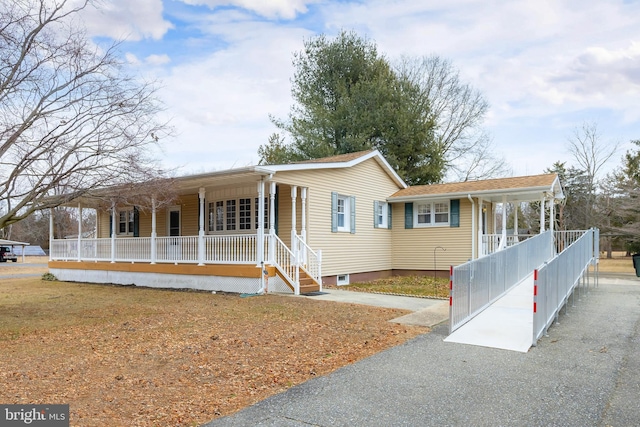 view of front of house featuring covered porch