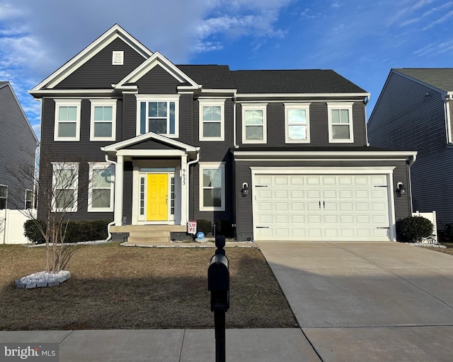 view of front of home with concrete driveway