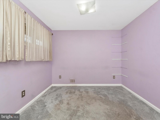 view of carpeted spare room